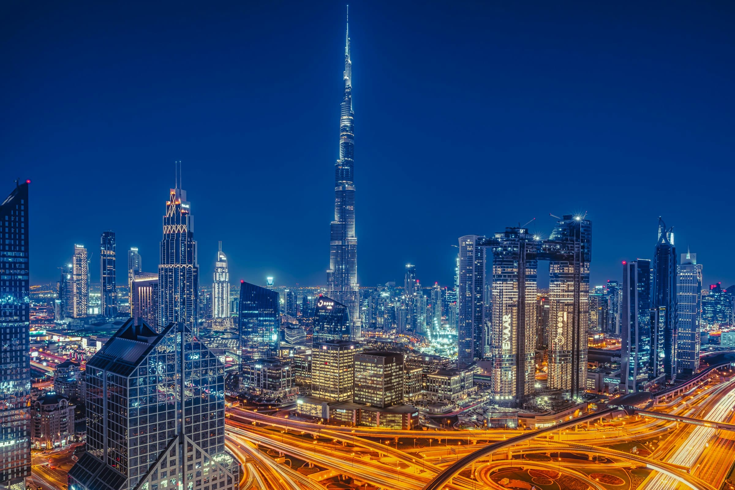 The Burj Khalifa above the lights of Downtown Dubai at night