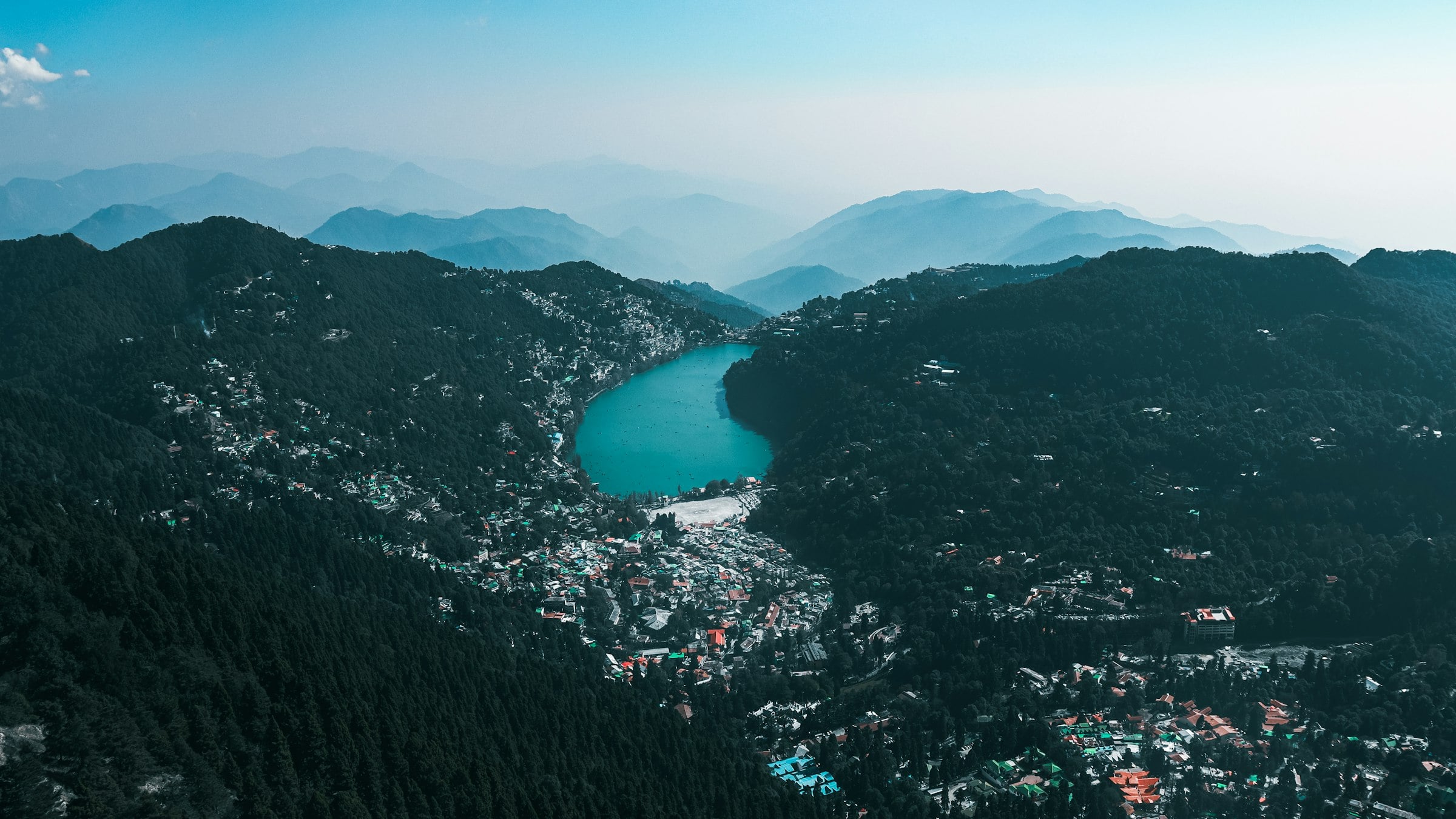 Naini Lake among forested hills, seen from Naina Peak in Nainital