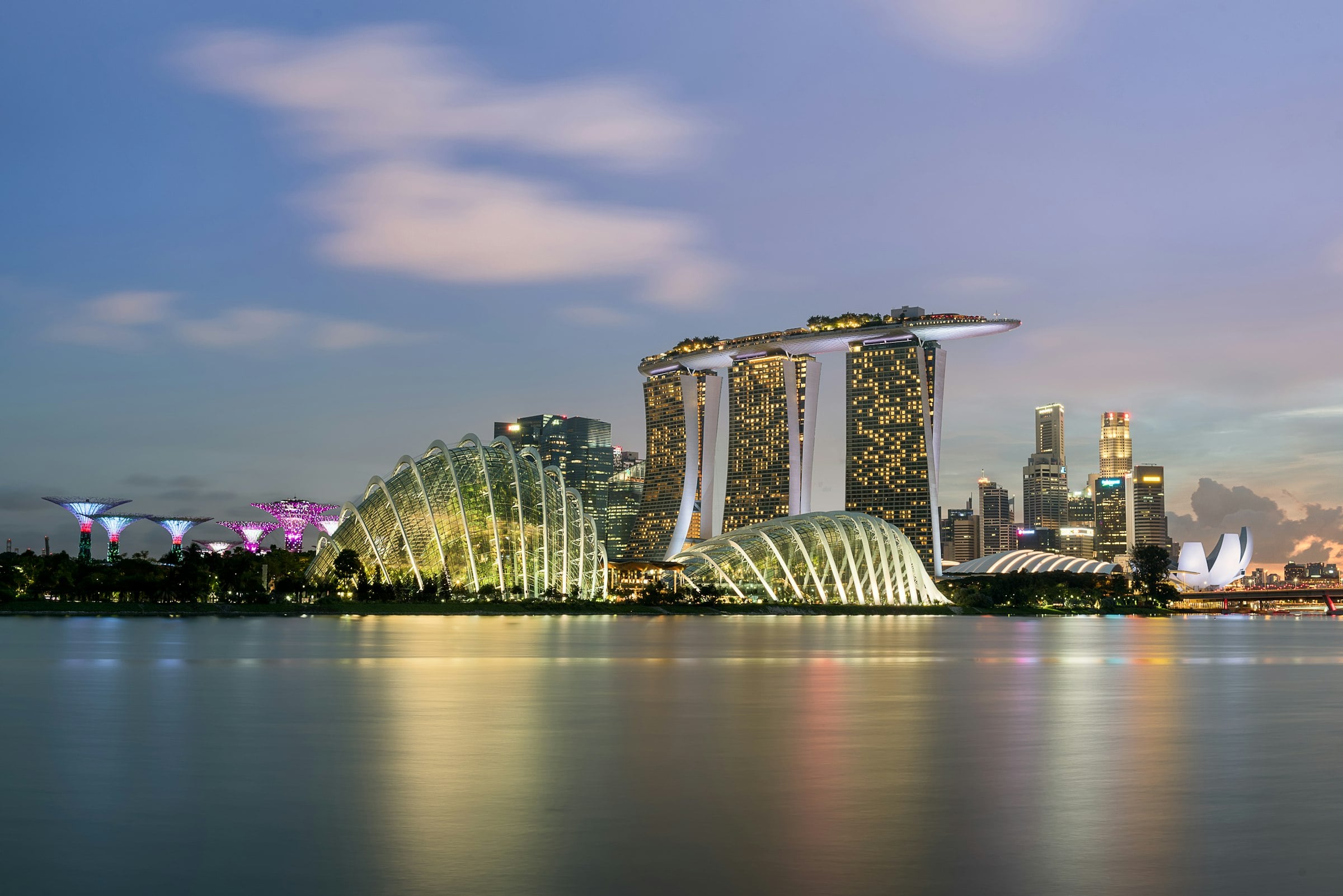 Marina Bay Sands and the domes of Gardens by the Bay at dusk, Singapore
